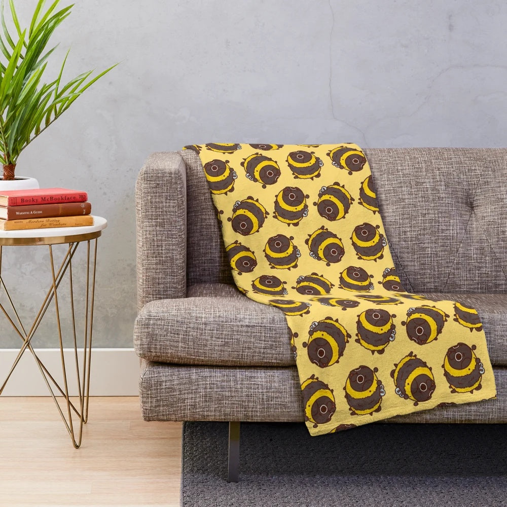 Cozy plush blanket with cute pug and bee design