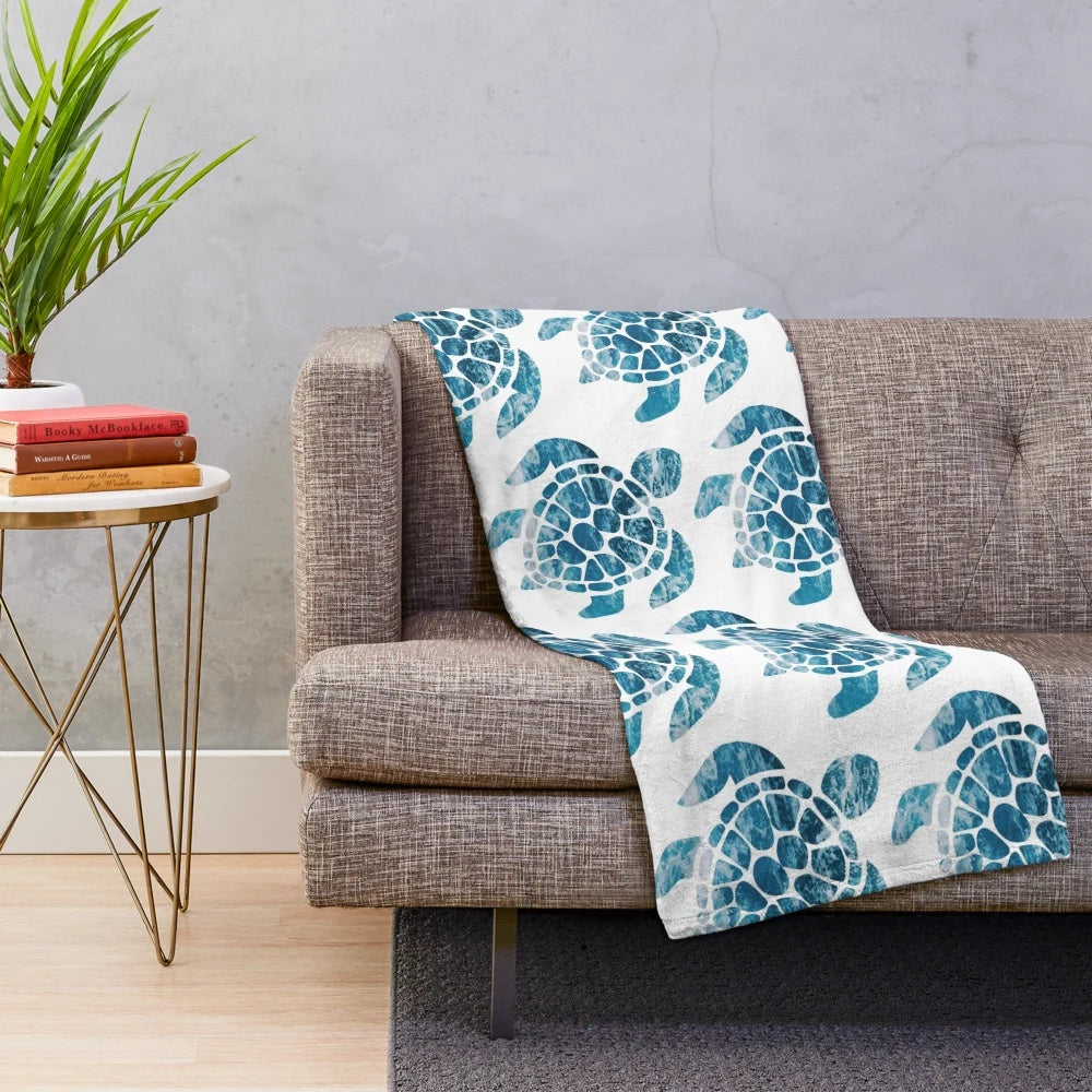 Cozy and soft plush sea turtle blanket with ocean waves design