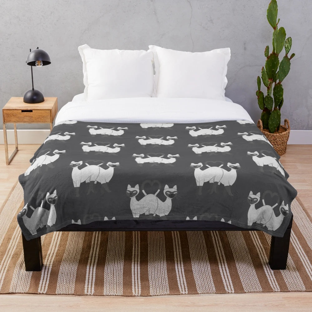 Soft and cuddly plush blanket featuring adorable Siamese cats