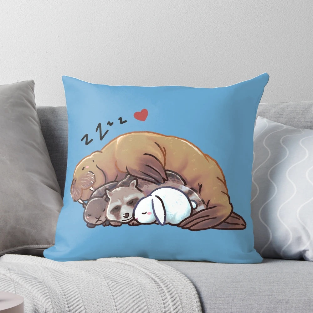 Colorful pillow featuring sleeping GOTG characters like Rocket the raccoon, Lylla the otter, and Teefs the walrus in a cozy, cuddling scene.