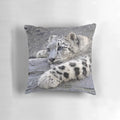 Cozy snow leopard-themed plush pillow for home décor