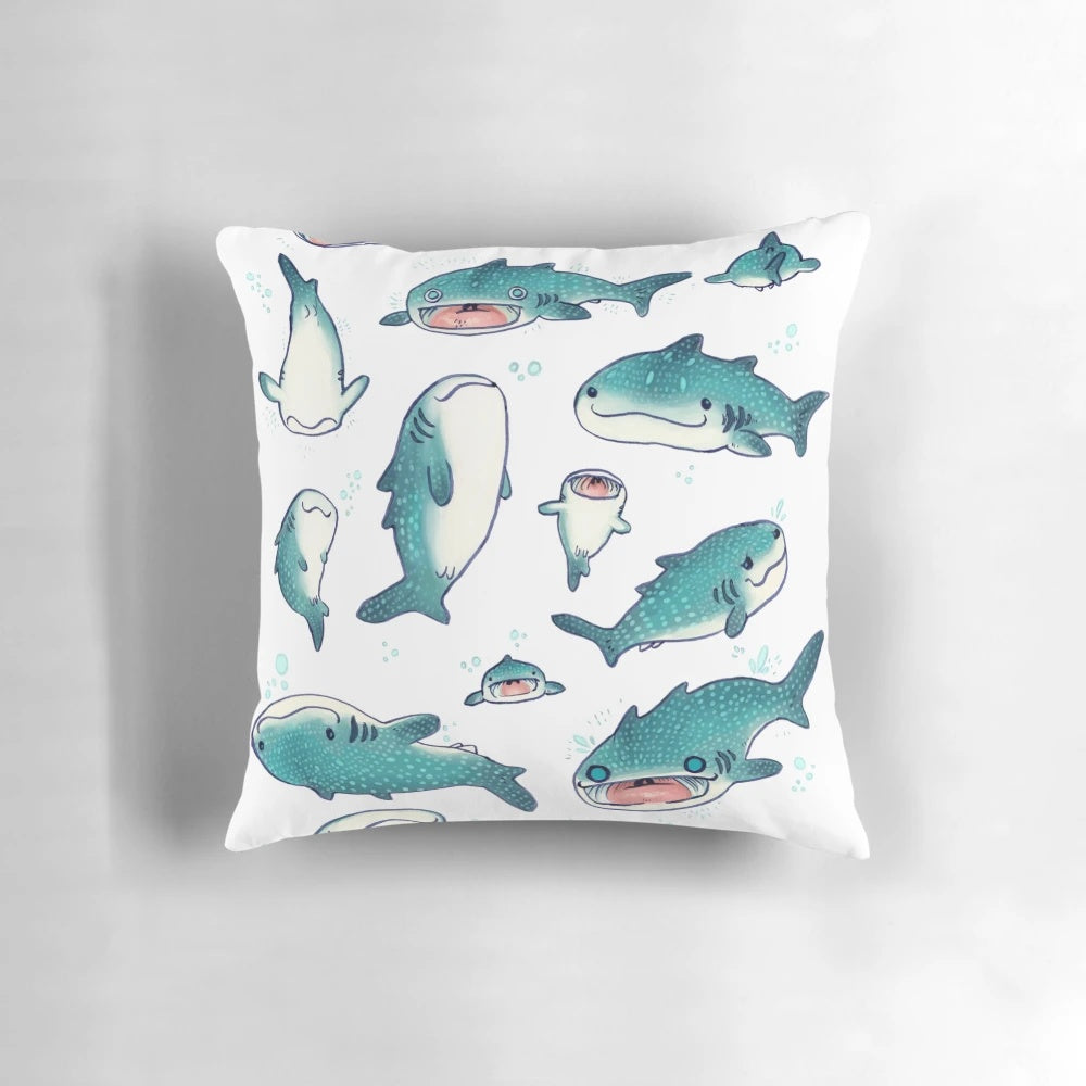 A soft, plush whale shark pillow in a blue and white color scheme, perfect for adding a touch of marine life to any space.