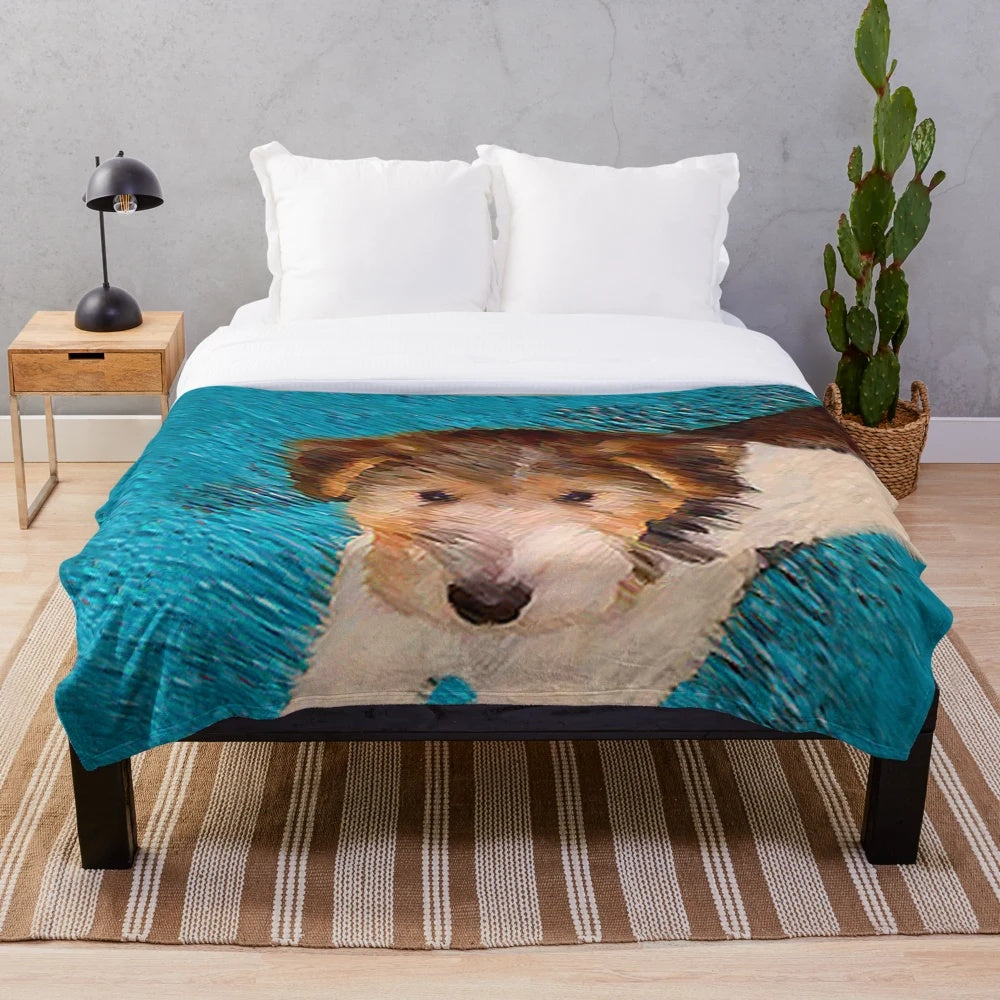 Wire fox terrier puppy portrait on a plush blanket