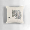 A plush pillow featuring an illustration of a wombat and a blue fairy wren, an iconic Australian wildlife duo.