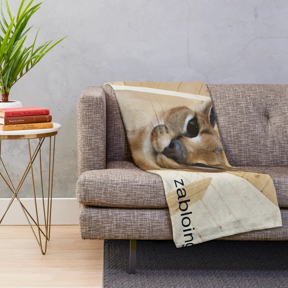 Zabloing meme inspired plush blanket with a cute caracal cat design
