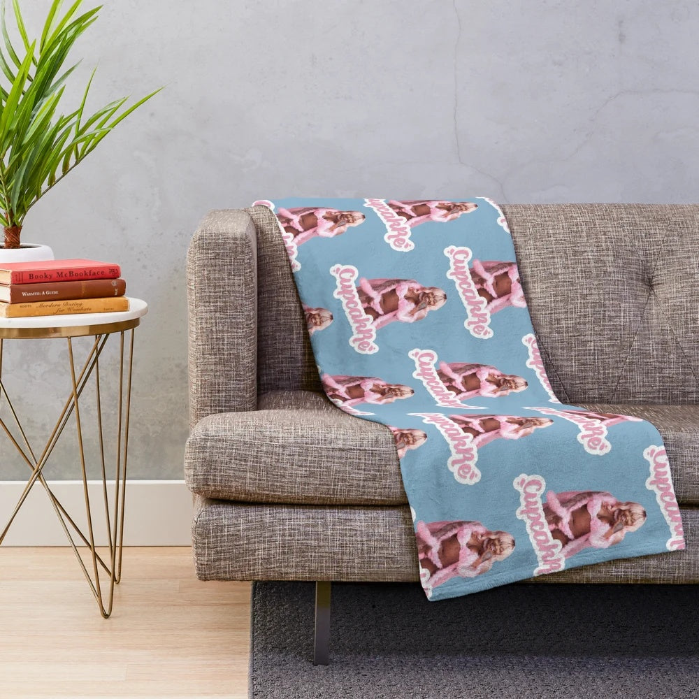 Colorful plush blanket featuring cupcakke's name and design