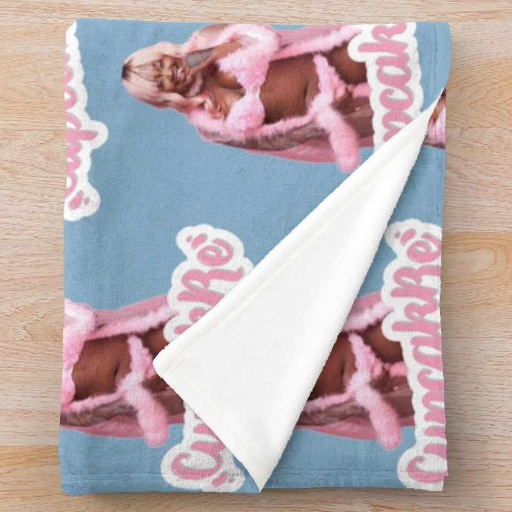 Colorful plush blanket featuring cupcakke's name and design