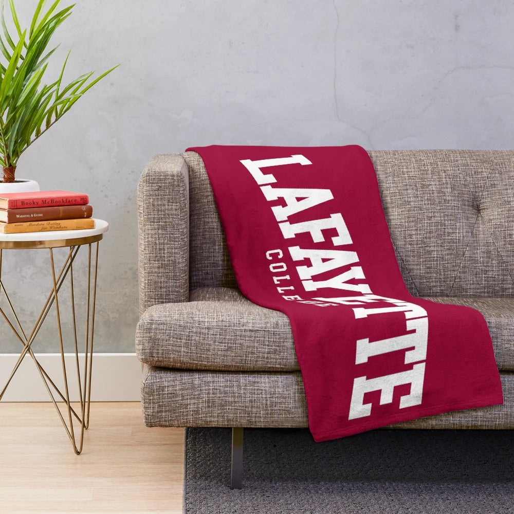 Curved college font plush blanket featuring the Lafayette college logo