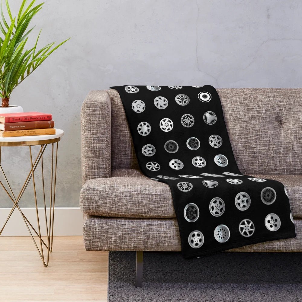 Custom automotive enthusiast plush blanket with car wheel and tire design