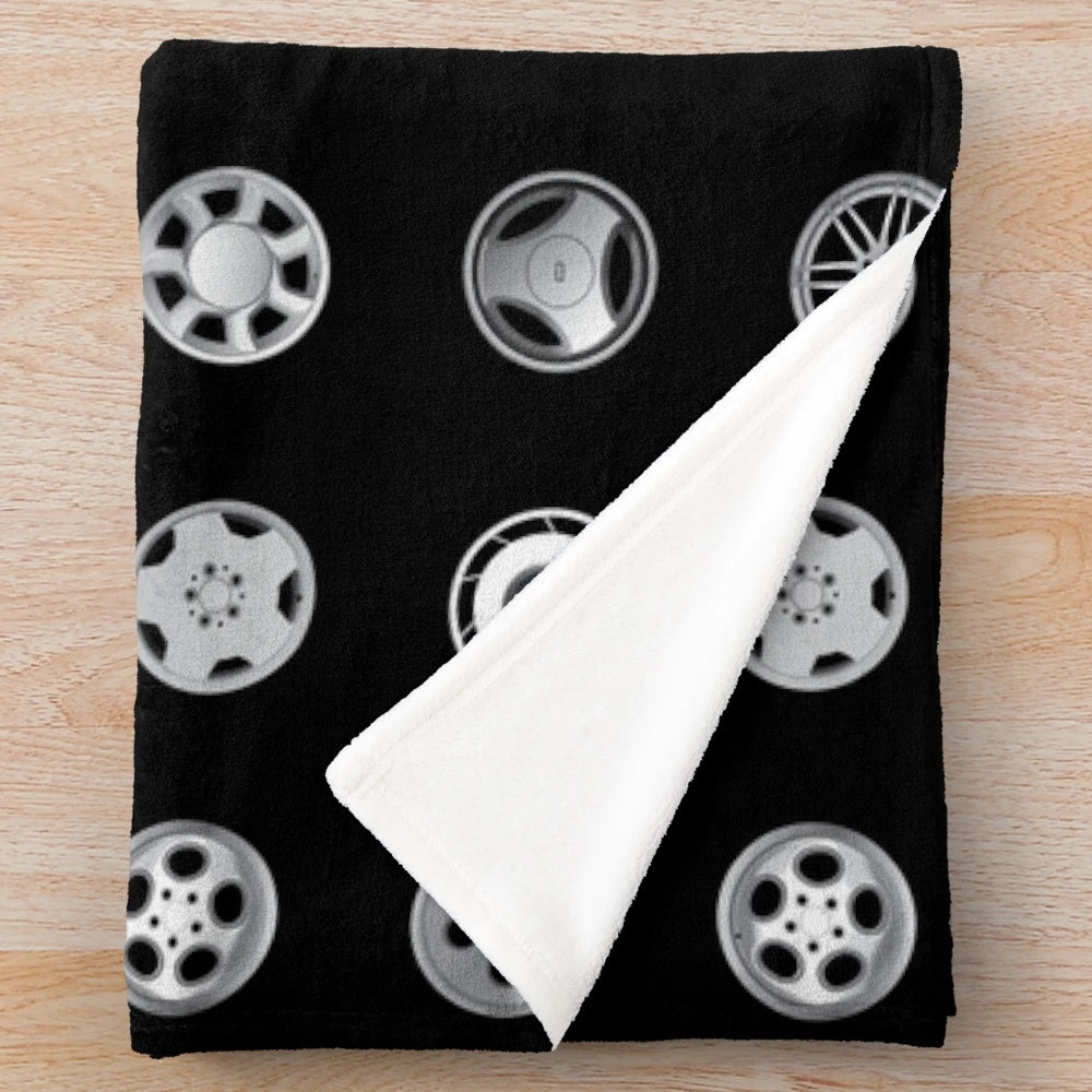 Custom automotive enthusiast plush blanket with car wheel and tire design