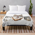 Plush blanket featuring watercolor designs of Siberian huskies, tabby cats, puppies, and kittens