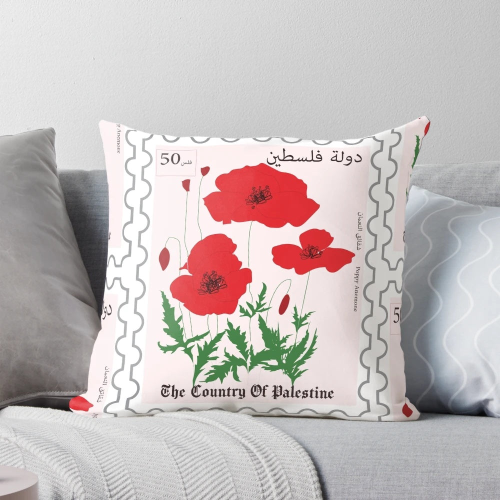 Vibrant poppy flowers in Palestinian postage design on a pillow