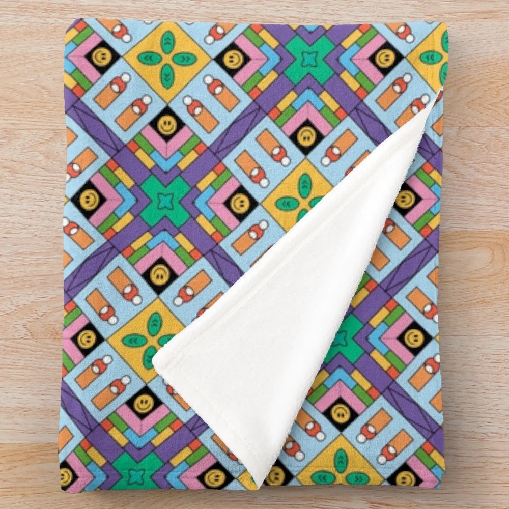 Patterned plush blanket with abstract geometric design