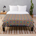 Patterned plush blanket with a variety of designs