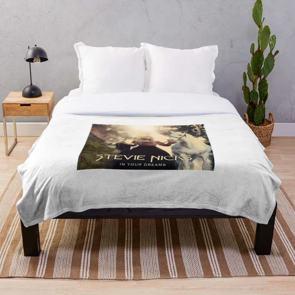 Plush music-themed blanket for cozy listening sessions