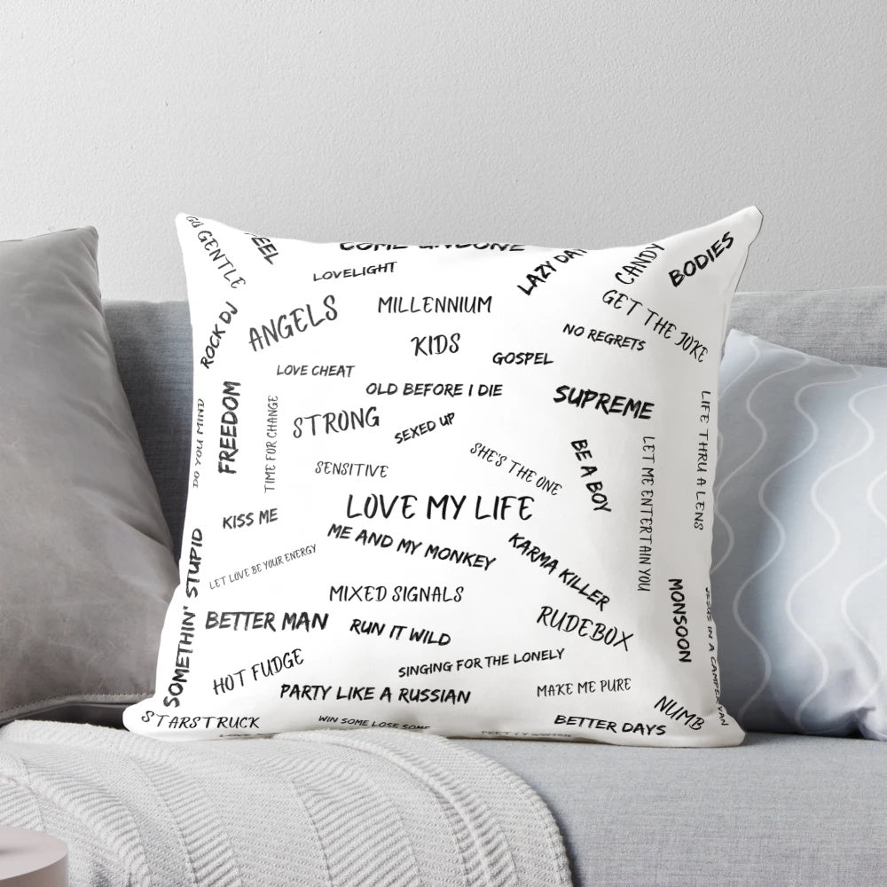 Pillow with Robbie Williams song titles printed on it