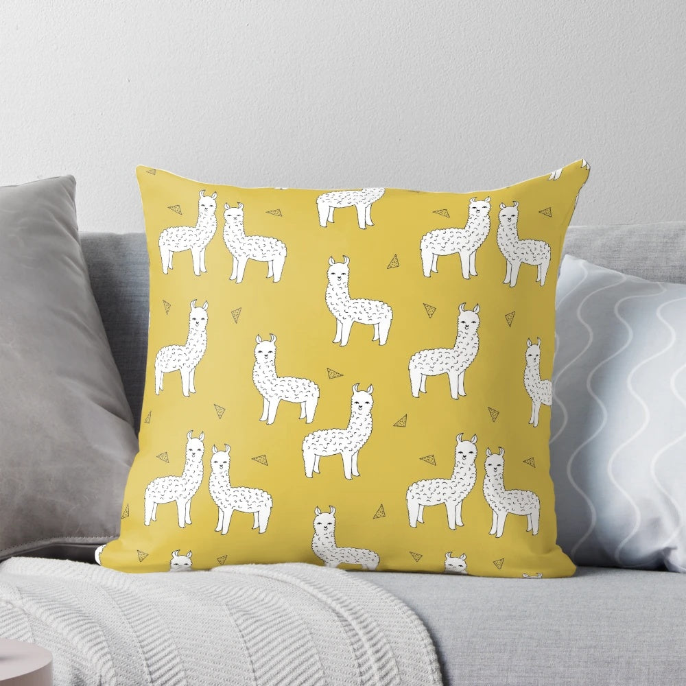Alpaca-themed decorative pillow in mustard color, designed by Andrea Lauren