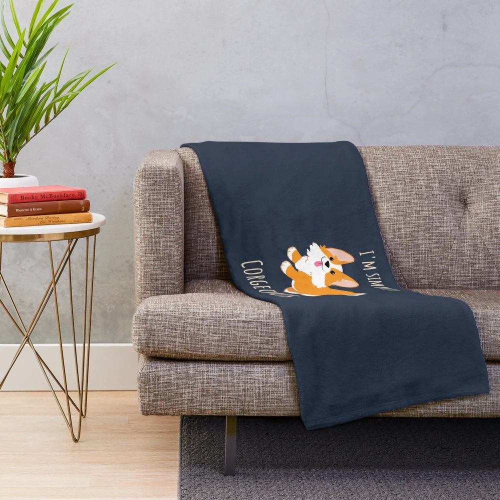 Soft and cozy plush blanket featuring a cute corgi illustration