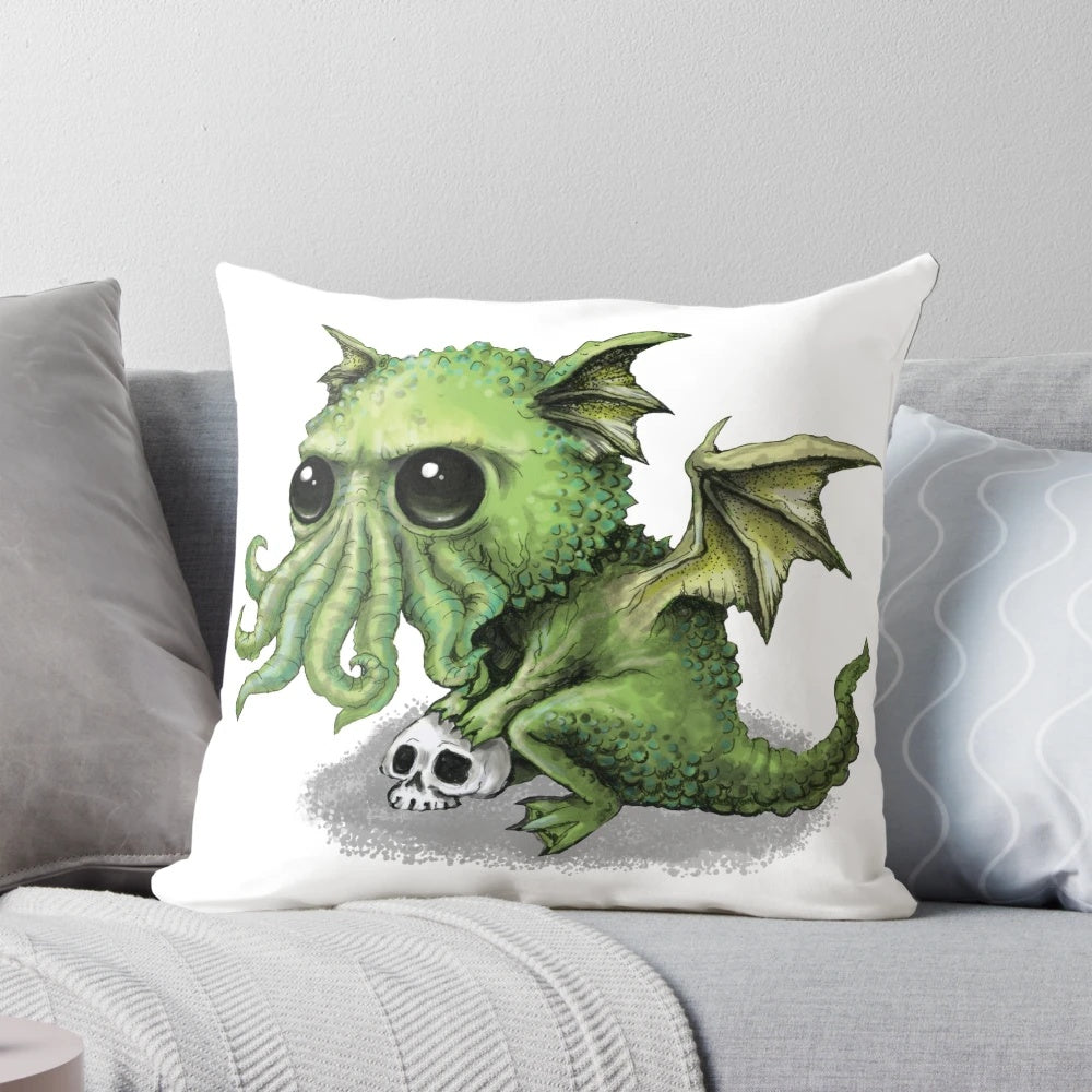 Cozy Cthulhu dragon plush pillow featuring a cute, ghoulish cosmic horror design