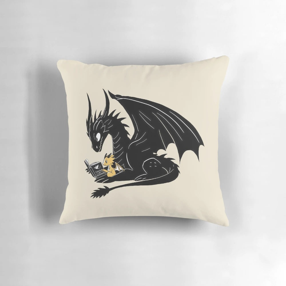 Illustration of two cute fantasy dragons reading together on a pillow.