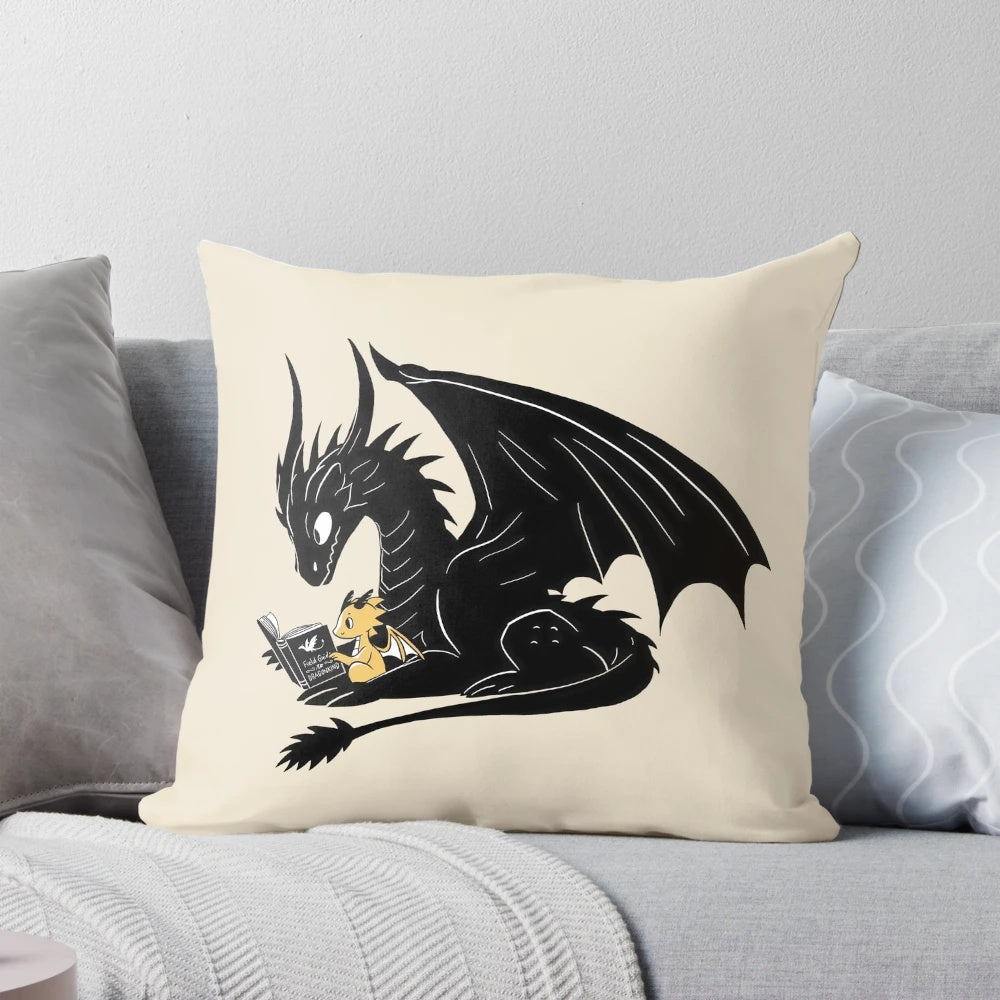 Illustration of two cute fantasy dragons reading together on a pillow.