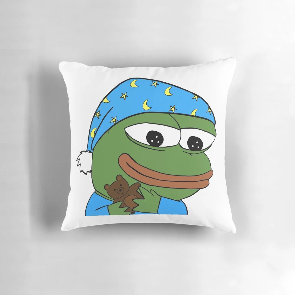 Soft, cuddly frog plush pillow in a cozy sleeping pose