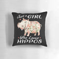 A floral and pink pillow featuring a hippopotamus design, perfect for girls and women who love hippos.