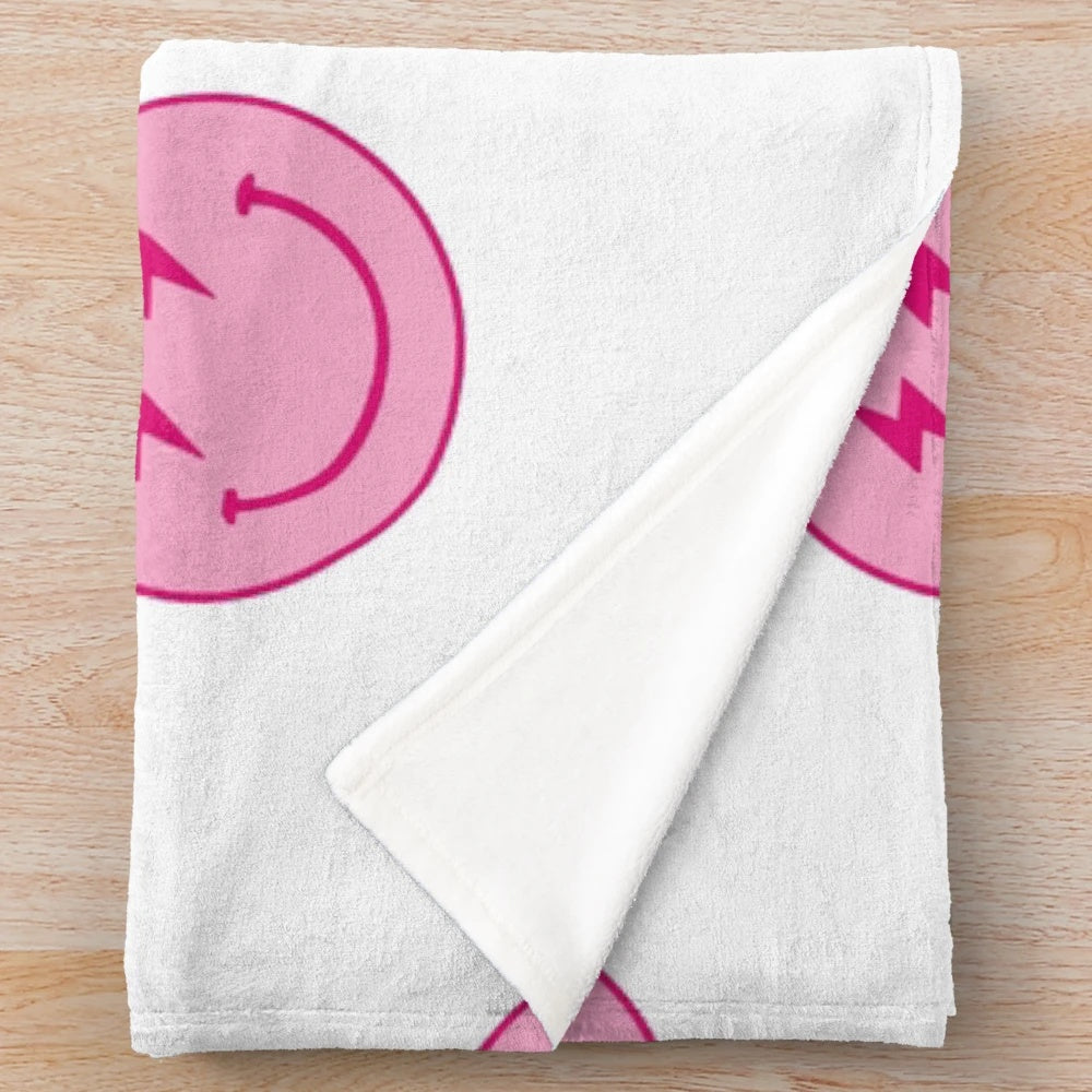 Hot pink plush blanket with lighting bolt and smiley face design