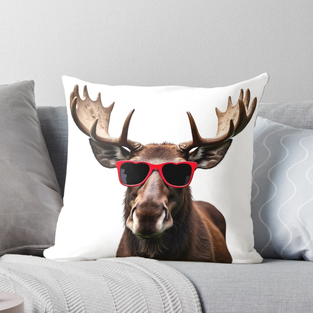 A plush pillow featuring a moose wearing heart-shaped sunglasses, perfect for nature and wildlife lovers.