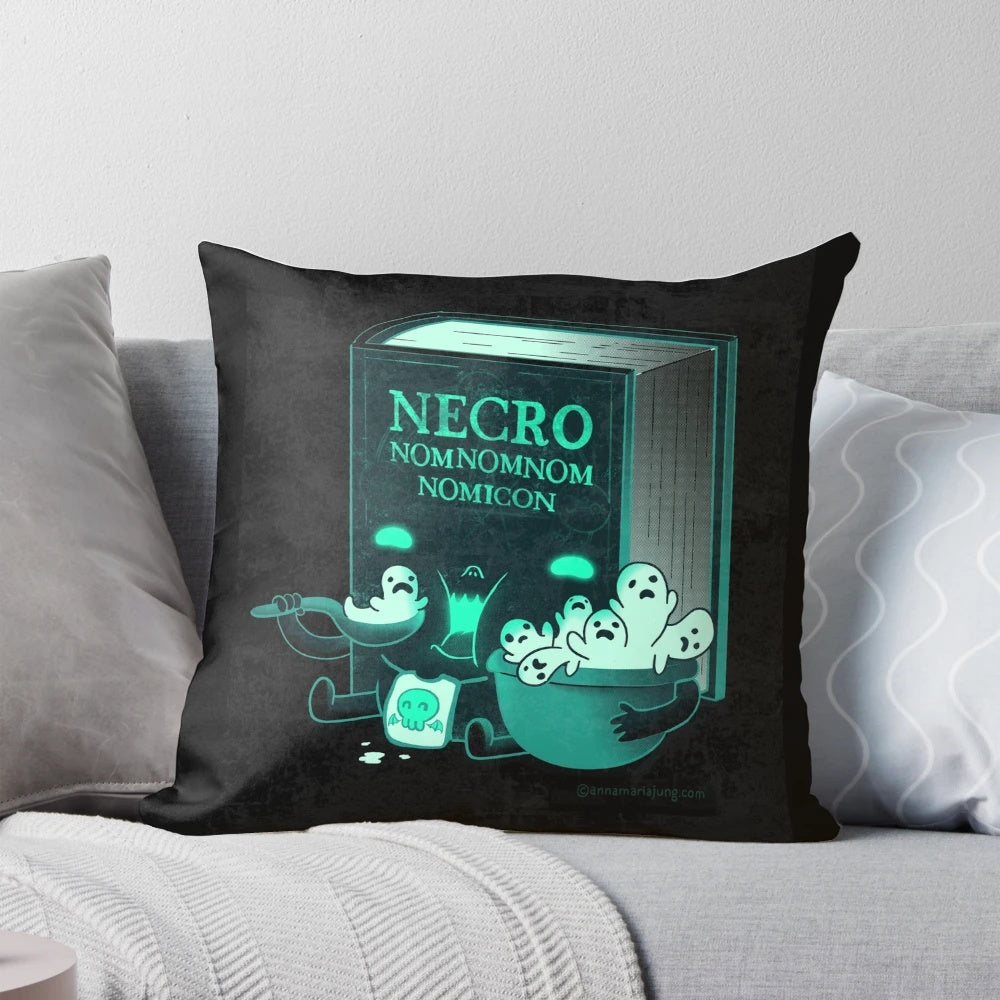 Adorable Necronomicon-themed pillow with a whimsical "nomnomnom" design, perfect for Lovecraft and Cthulhu fans.