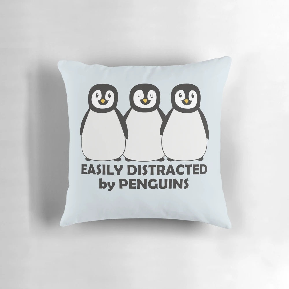Adorable chubby penguins graphic illustration design on a black and white pillow