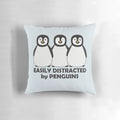 Adorable chubby penguins graphic illustration design on a black and white pillow