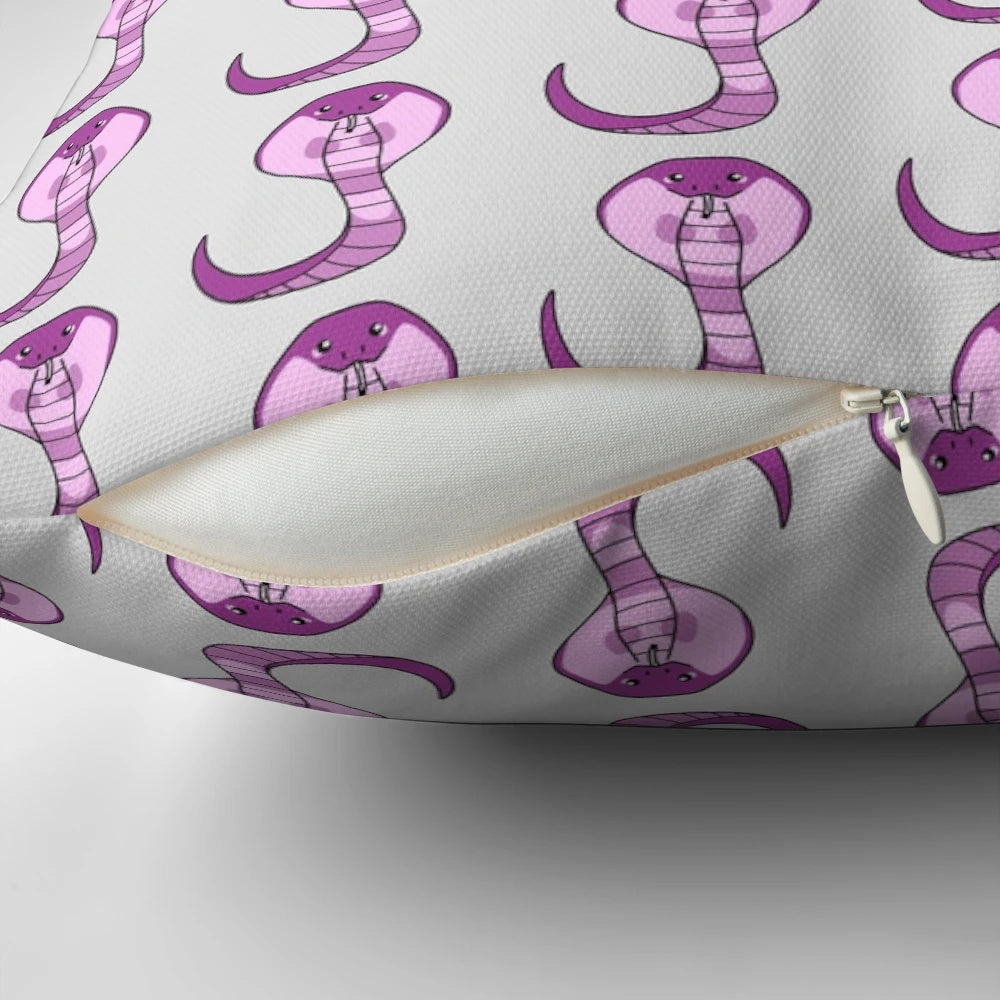 A cute and whimsical pink cobra throw pillow, perfect for adding a touch of playfulness to any room.