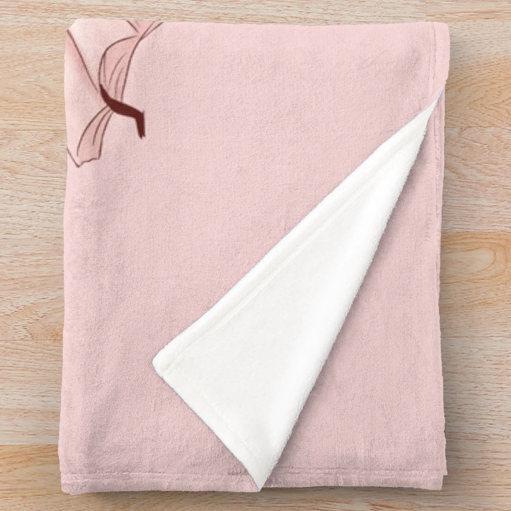 Cute pink plush blanket featuring a bookworm girl design