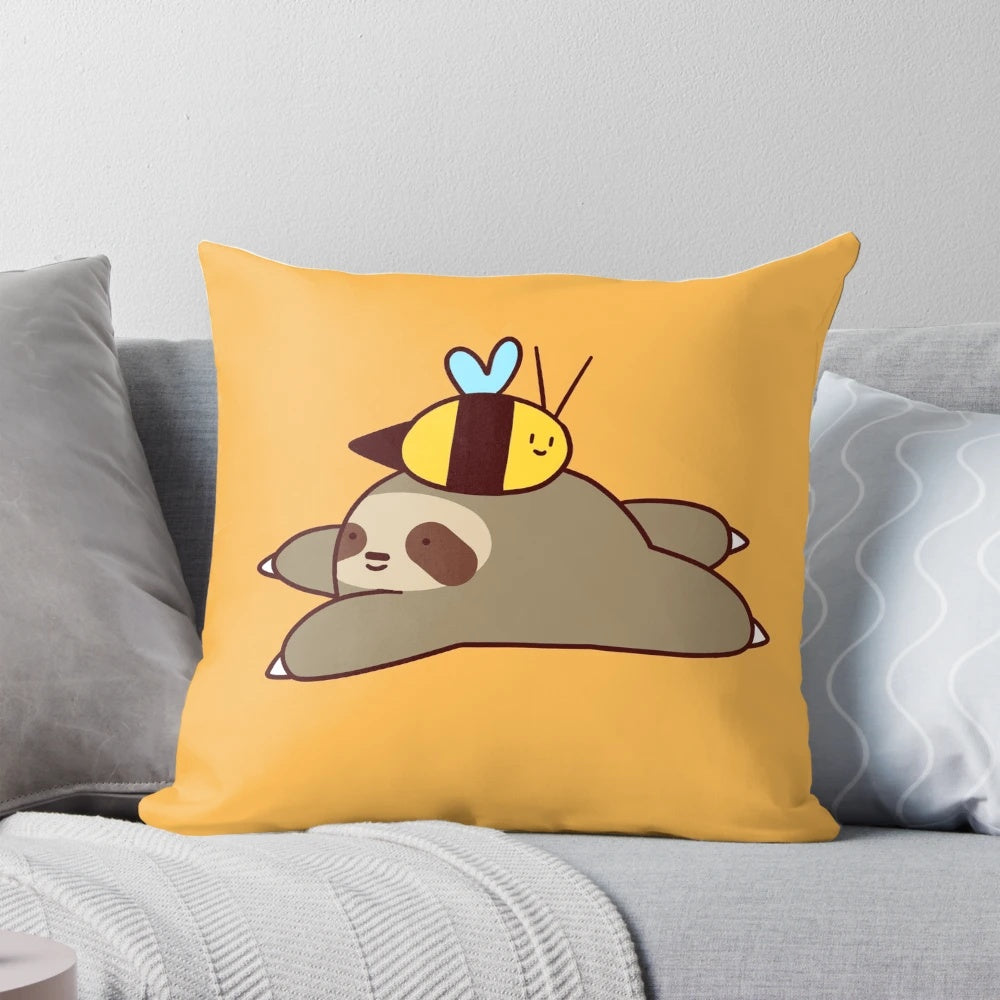 Adorable cartoon sloth and bumble bee printed on a soft, plush pillow