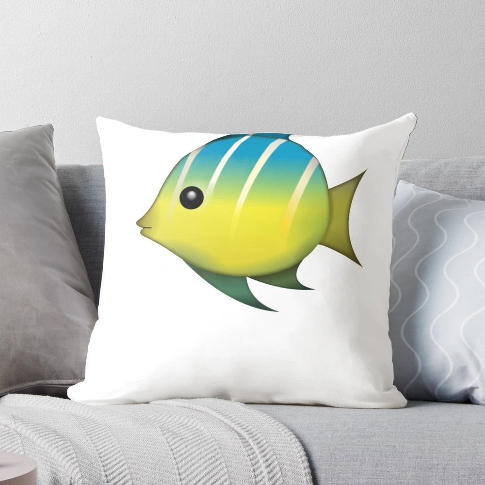 A soft, plush pillow featuring a cute tropical fish emoji design, perfect for adding a touch of whimsy to your home.