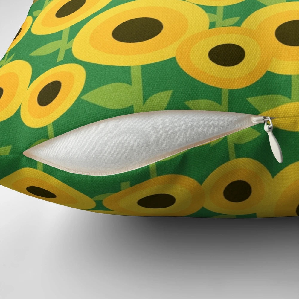 Colorful cycling-themed pillow with bicycle, mountain, and sunflower motifs