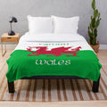 Plush blanket featuring the iconic Welsh Dragon flag design