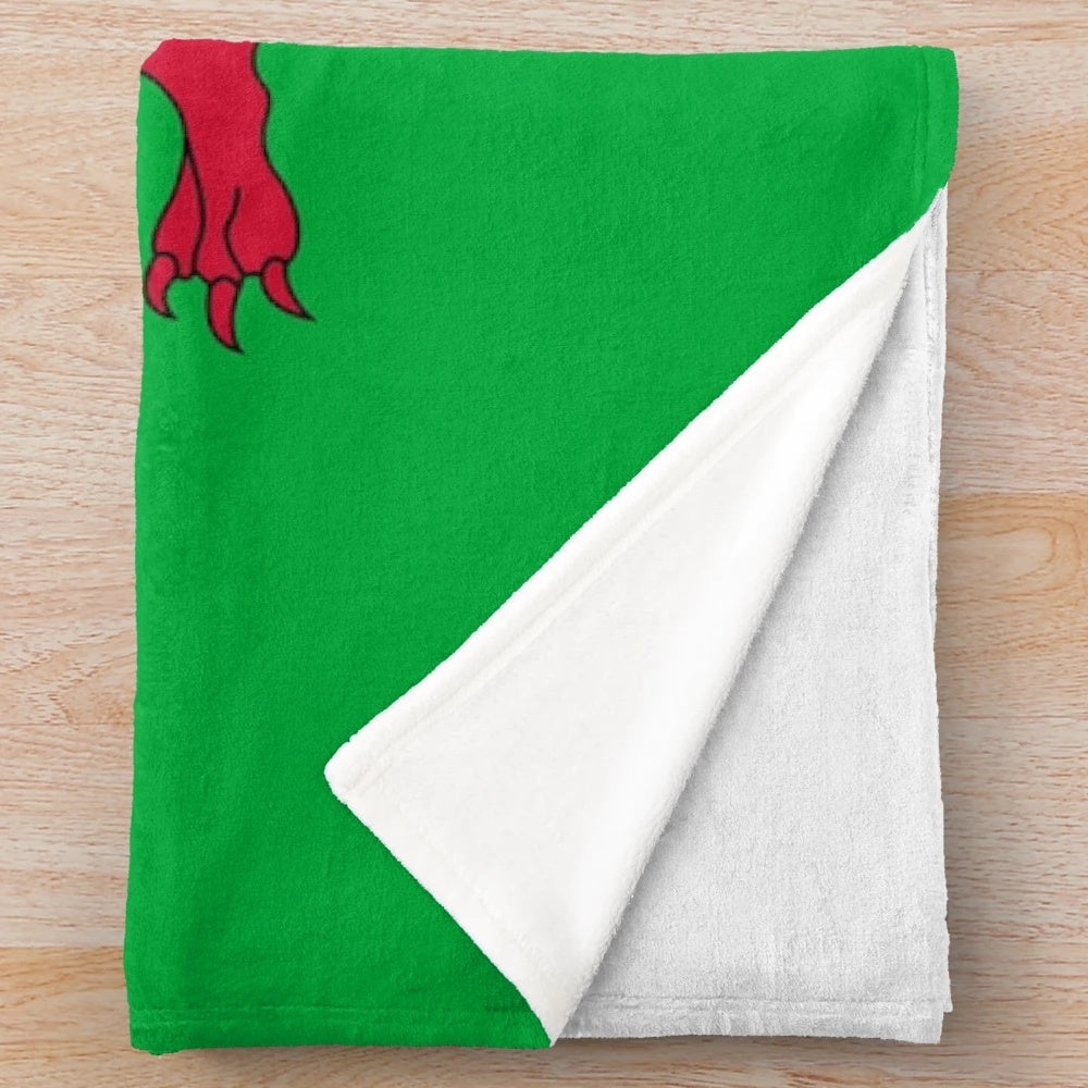 Plush blanket featuring the iconic Welsh Dragon flag design