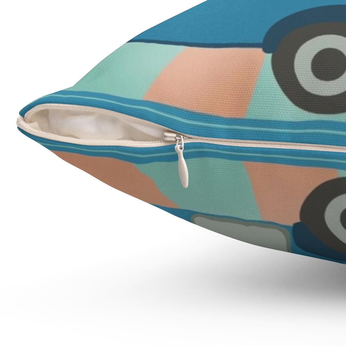 Vintage-inspired throw pillow featuring a retro touring caravan design - Detail