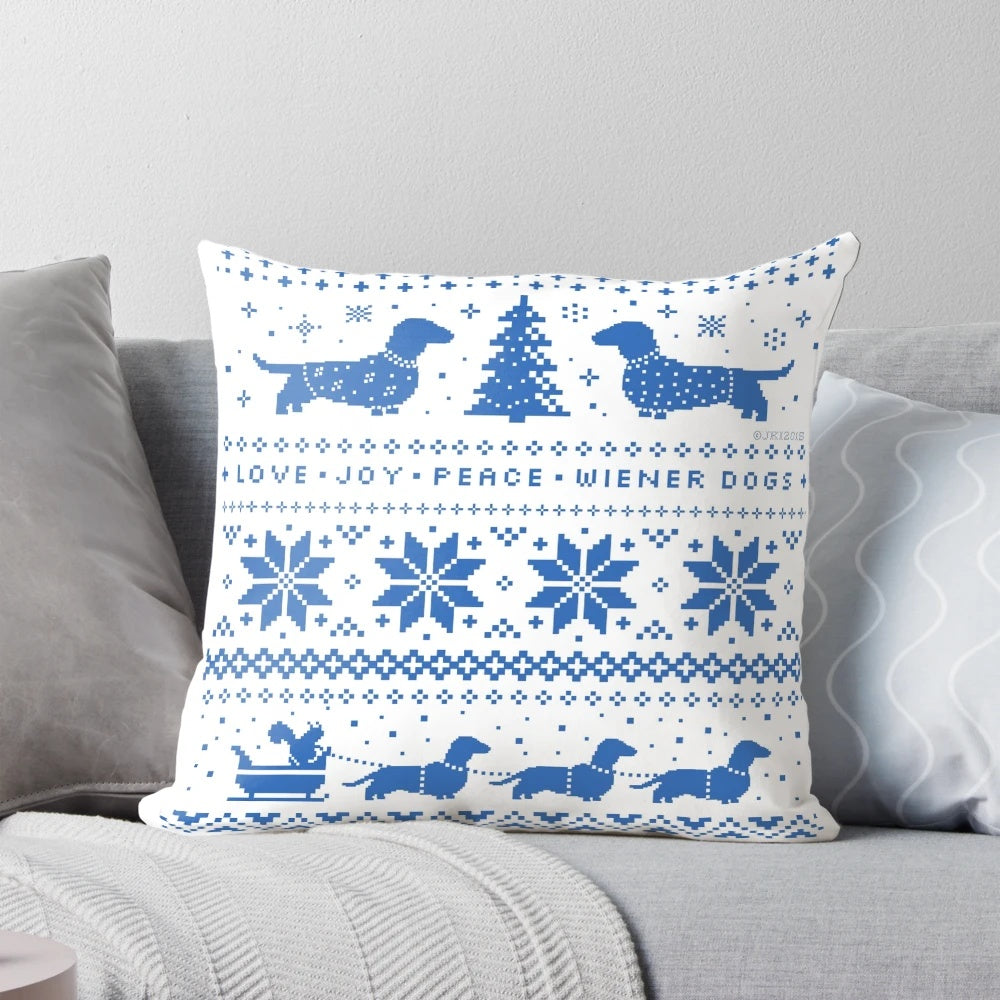 A cozy dachshund Christmas pillow featuring a blue and white holiday pattern, perfect for dog lovers and home decor.