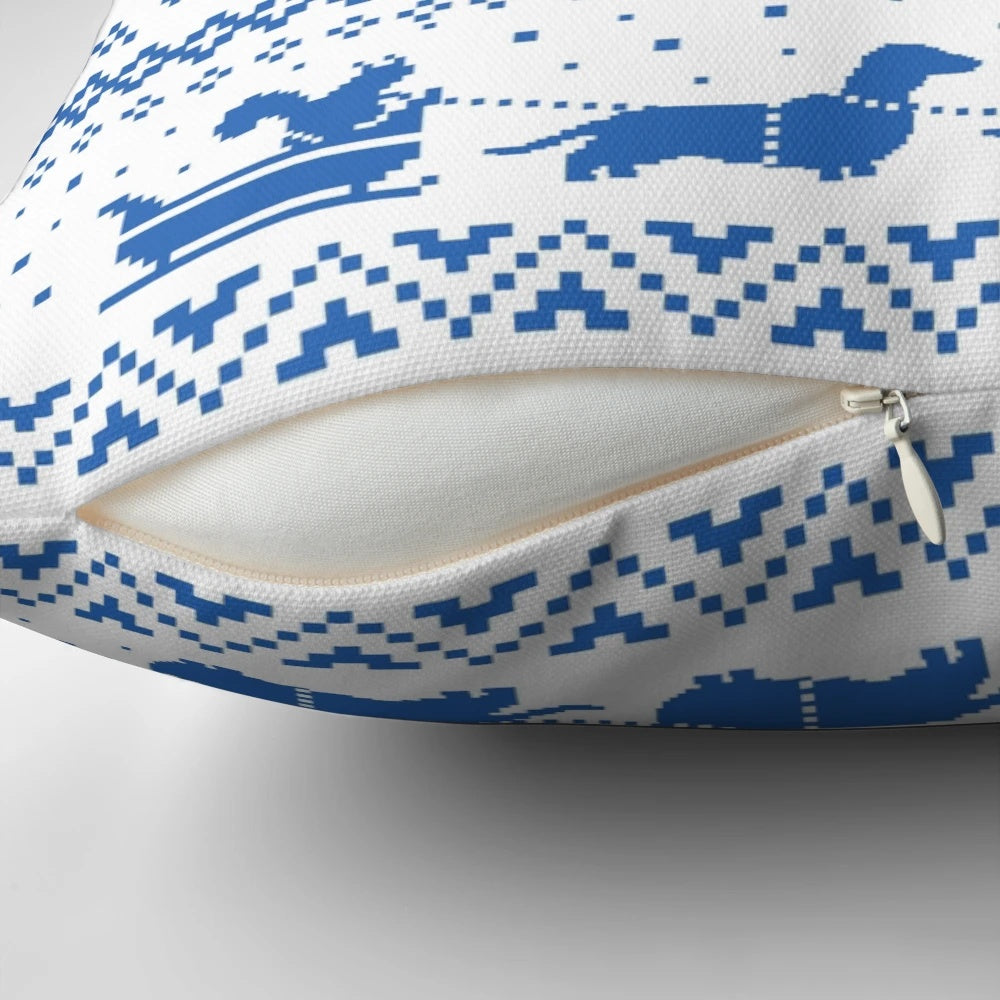 A cozy dachshund Christmas pillow featuring a blue and white holiday pattern, perfect for dog lovers and home decor.