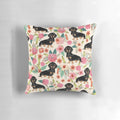 Dachshund dog surrounded by colorful flowers on a decorative pillow