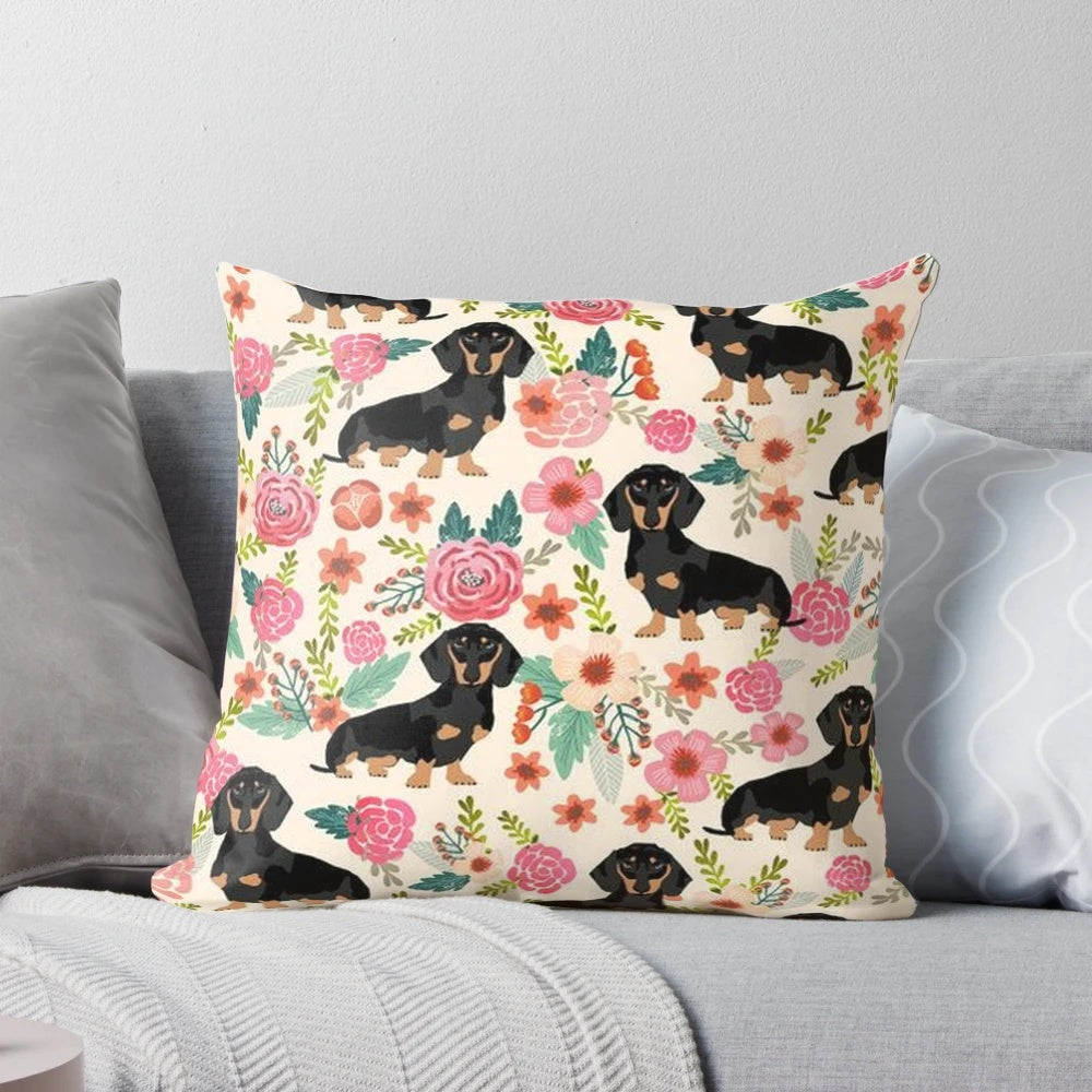 Dachshund dog surrounded by colorful flowers on a decorative pillow