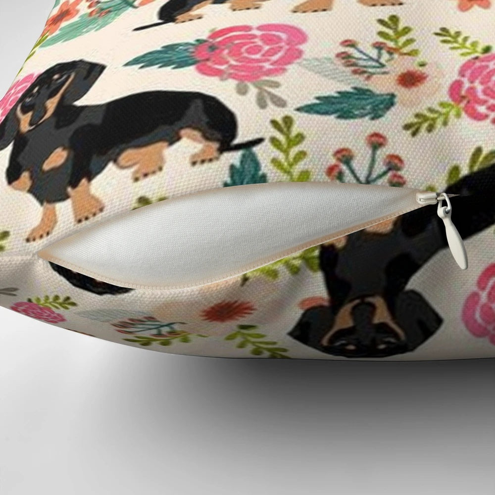 Dachshund dog surrounded by colorful flowers on a decorative pillow