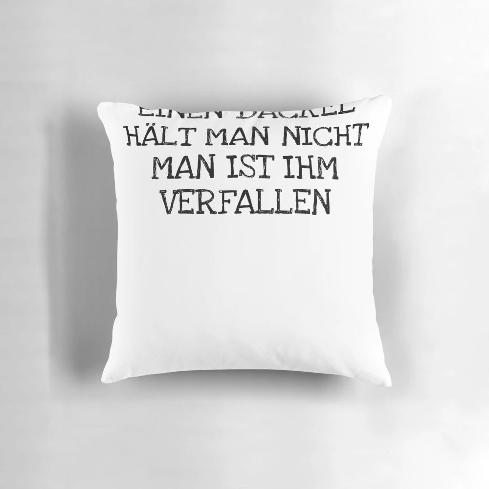 A cozy pillow featuring a charming dachshund design, perfect for dog lovers and home decor.