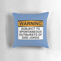 Funny dad joke pillow with the text "WARNING: SUBJECT TO SPONTANEOUS OUTBURSTS OF DAD JOKES