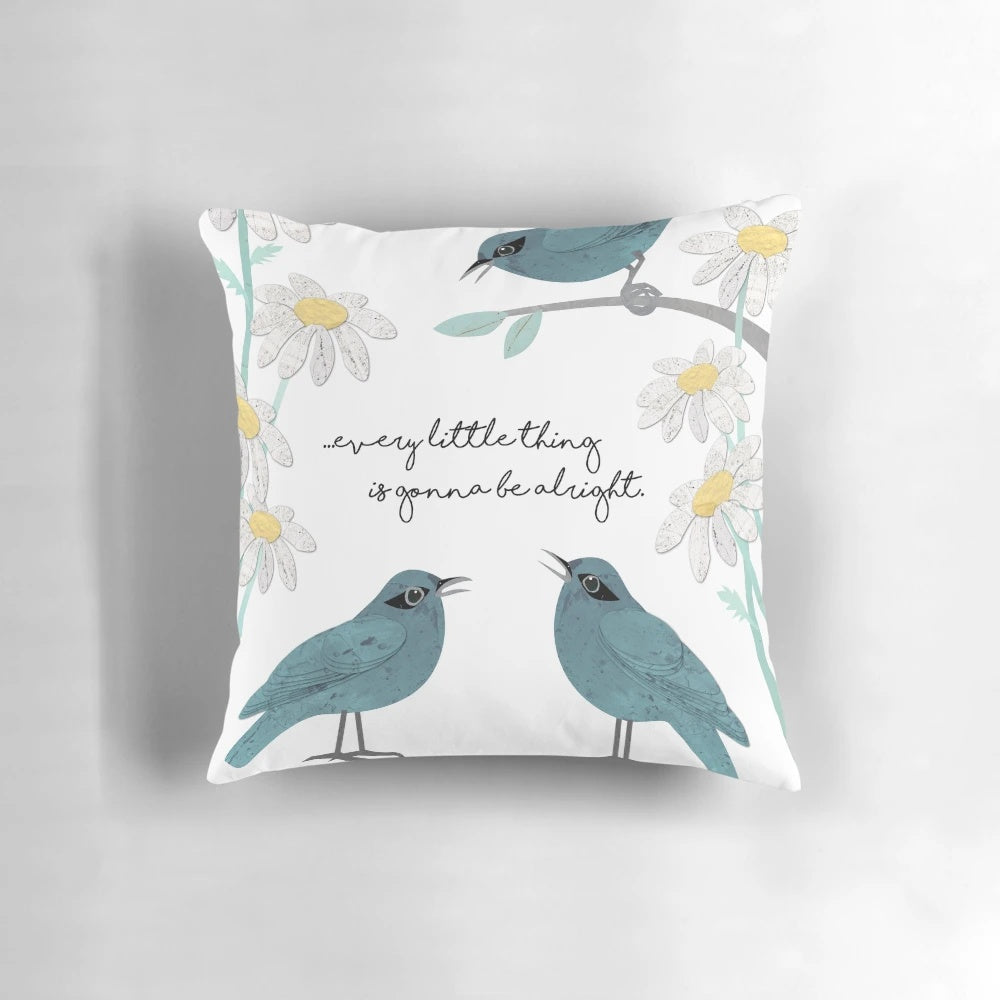 Throw pillow featuring a collage design with daisies, birds, and inspirational lyrics