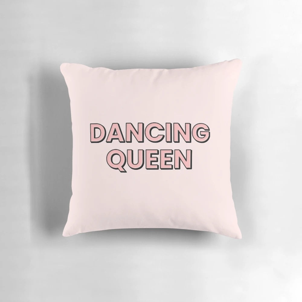 A stylish pink pillow featuring a bold "Dancing Queen" text in black block letters, perfect for ABBA and music lovers.