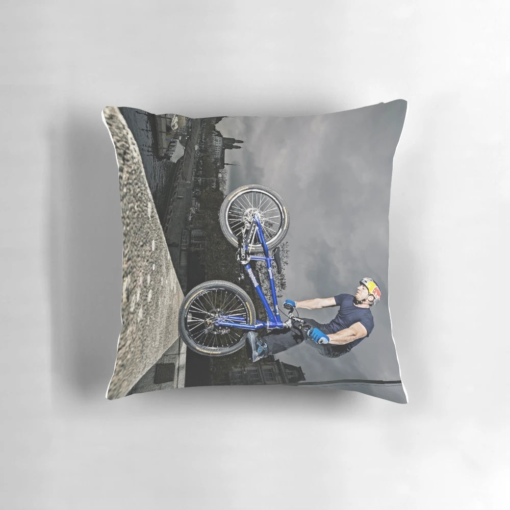 A plush pillow featuring the legendary trials rider Danny MacAskill and his signature tricks.